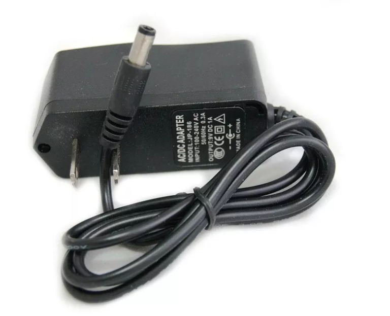 Eliminador de voltaje de 9V a 1A.